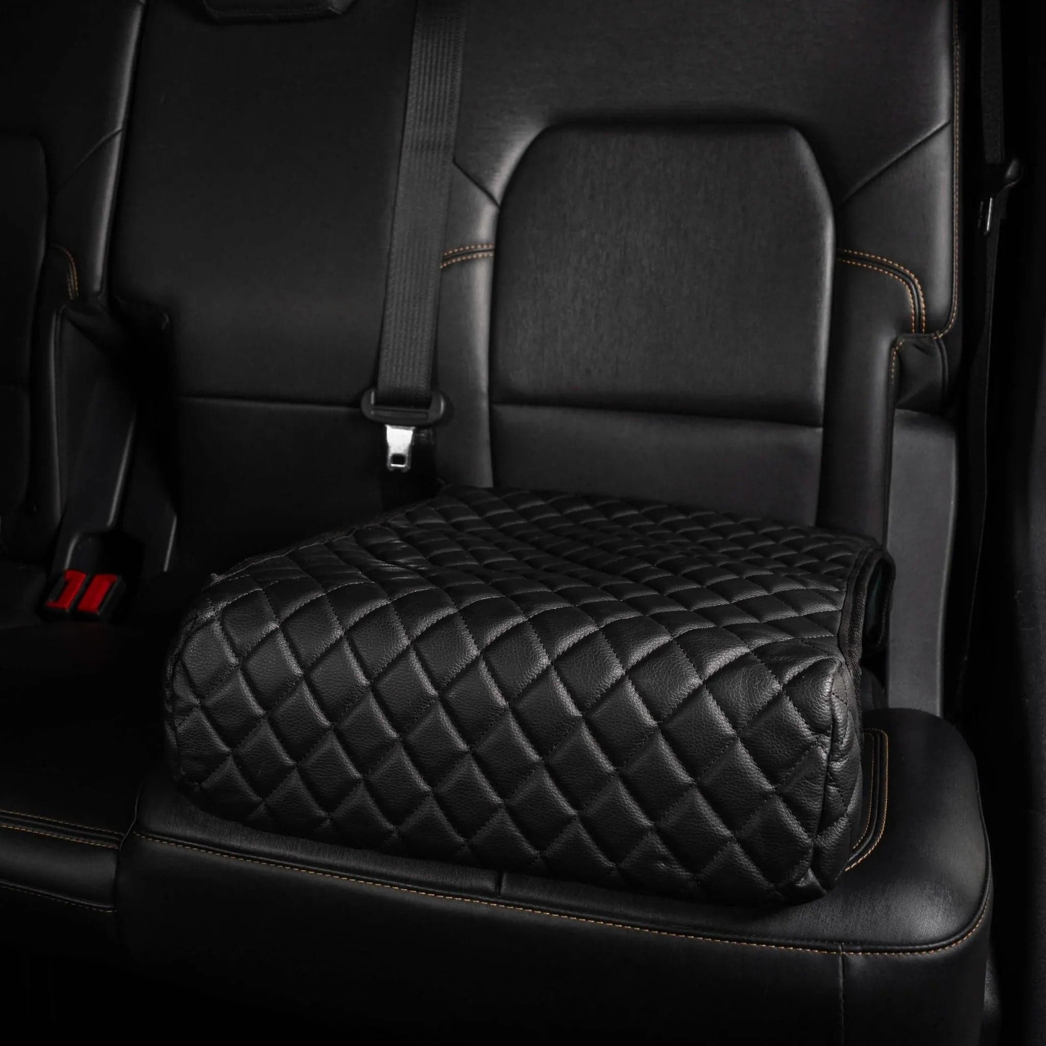 BoostedSafe Elite disguised under its quilted cover in a vehicle