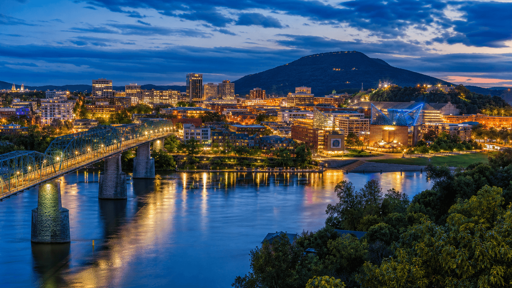 Chattanooga skyline, Tennessee River, and mountain landscape at blue hour